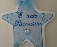 Bambino  Fiocco nascita stella legno con ricamo azzurro